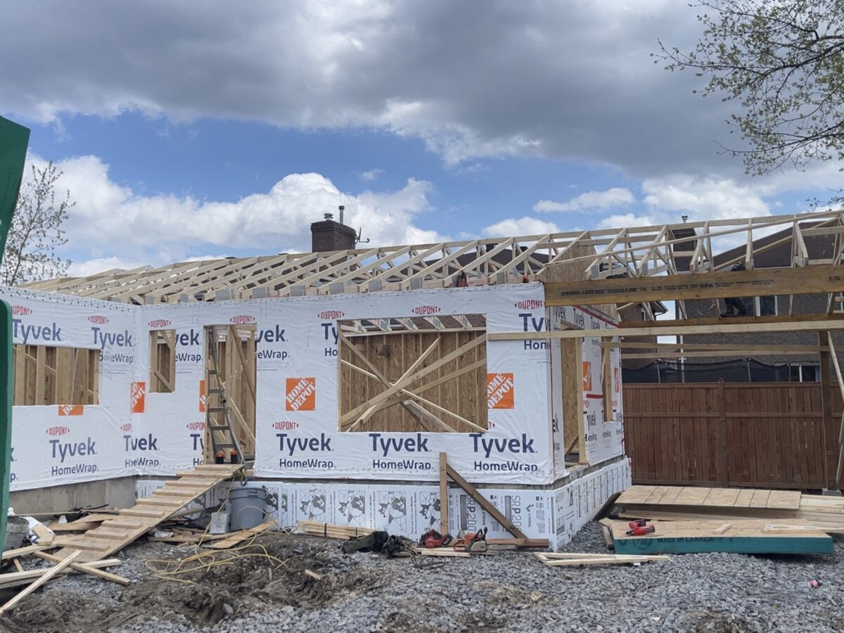 Residential framing project with equipment on site